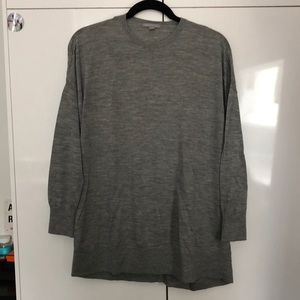 Super cute wool sweater with back knot detail!